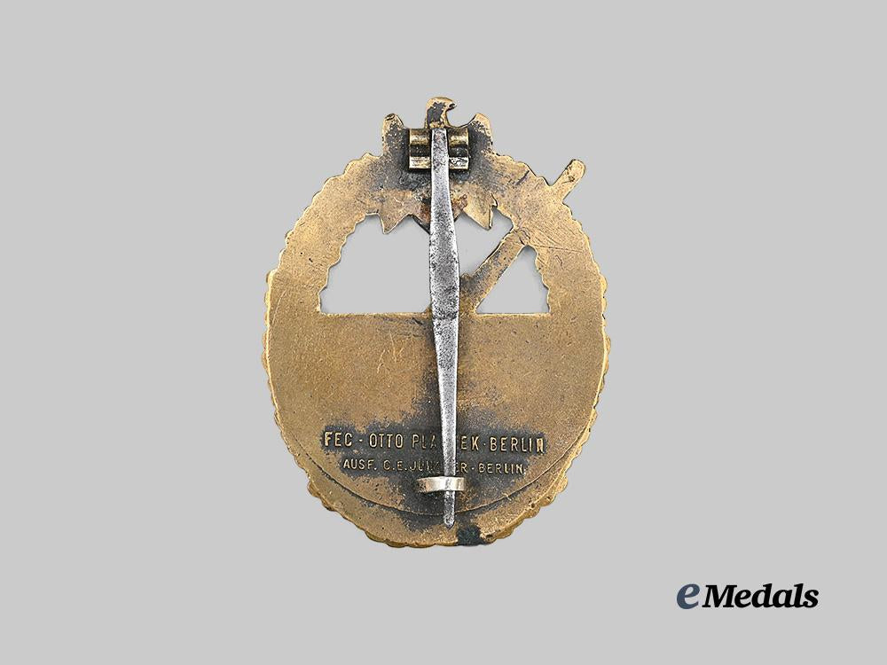 germany,_kriegsmarine._a_coastal_artillery_war_badge,_variation1,_refurbished_example_by_c._e._juncker_e_medals__g63180_3