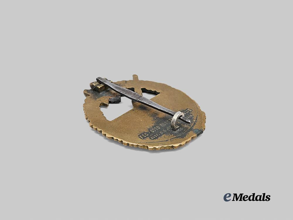 germany,_kriegsmarine._a_coastal_artillery_war_badge,_variation1,_refurbished_example_by_c._e._juncker_e_medals__g63180_4