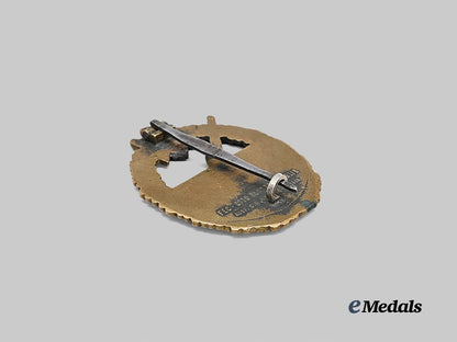 germany,_kriegsmarine._a_coastal_artillery_war_badge,_variation1,_refurbished_example_by_c._e._juncker_e_medals__g63180_4