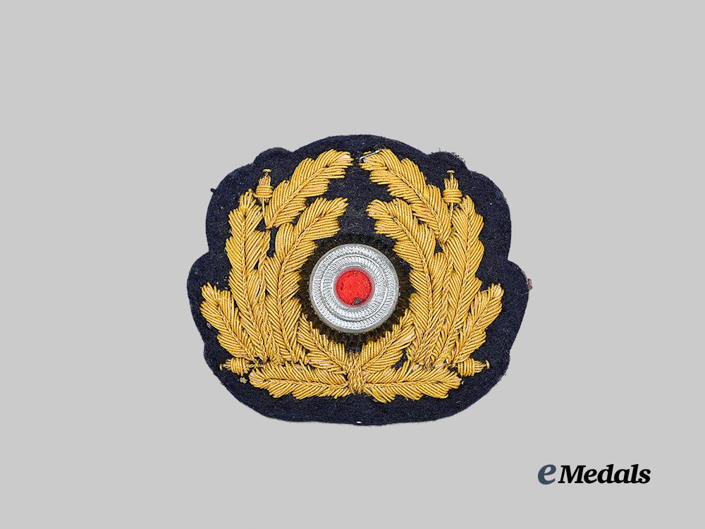 germany,_kriegsmarine._a_mint_officer’s_visor_cap_cockade_e_medals__g63185_2