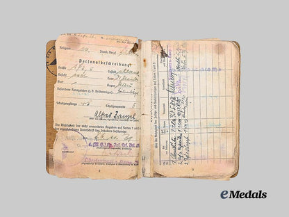 germany,_heer._a_soldbuch_to_alfred_heupel,_decorated_eastern_front_combatant_e_medals__g63194_4