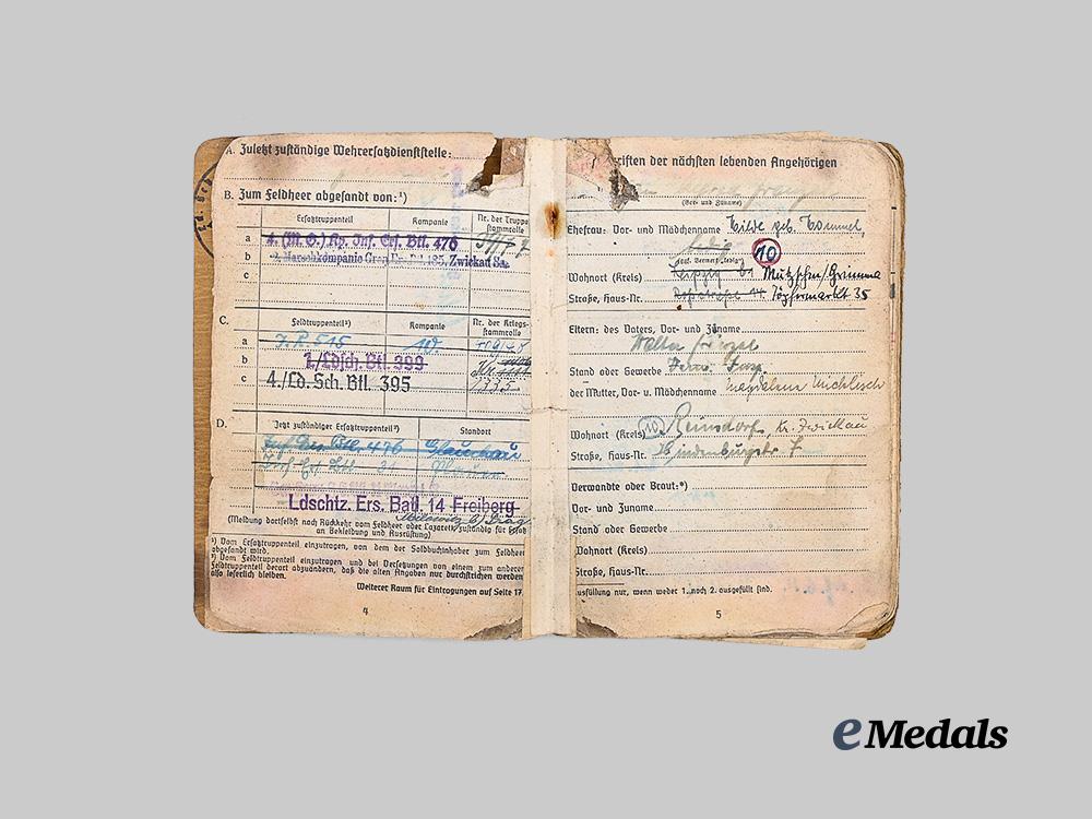 germany,_heer._a_soldbuch_to_alfred_heupel,_decorated_eastern_front_combatant_e_medals__g63194_5