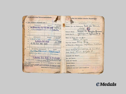 germany,_heer._a_soldbuch_to_alfred_heupel,_decorated_eastern_front_combatant_e_medals__g63194_5