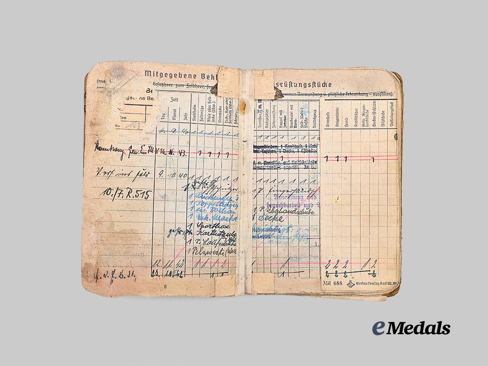germany,_heer._a_soldbuch_to_alfred_heupel,_decorated_eastern_front_combatant_e_medals__g63194_6