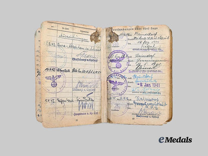 germany,_heer._a_soldbuch_to_alfred_heupel,_decorated_eastern_front_combatant_e_medals__g63194_8