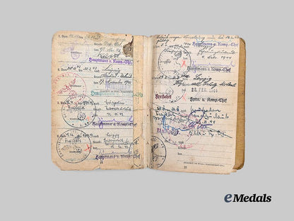 germany,_heer._a_soldbuch_to_alfred_heupel,_decorated_eastern_front_combatant_e_medals__g63194_9