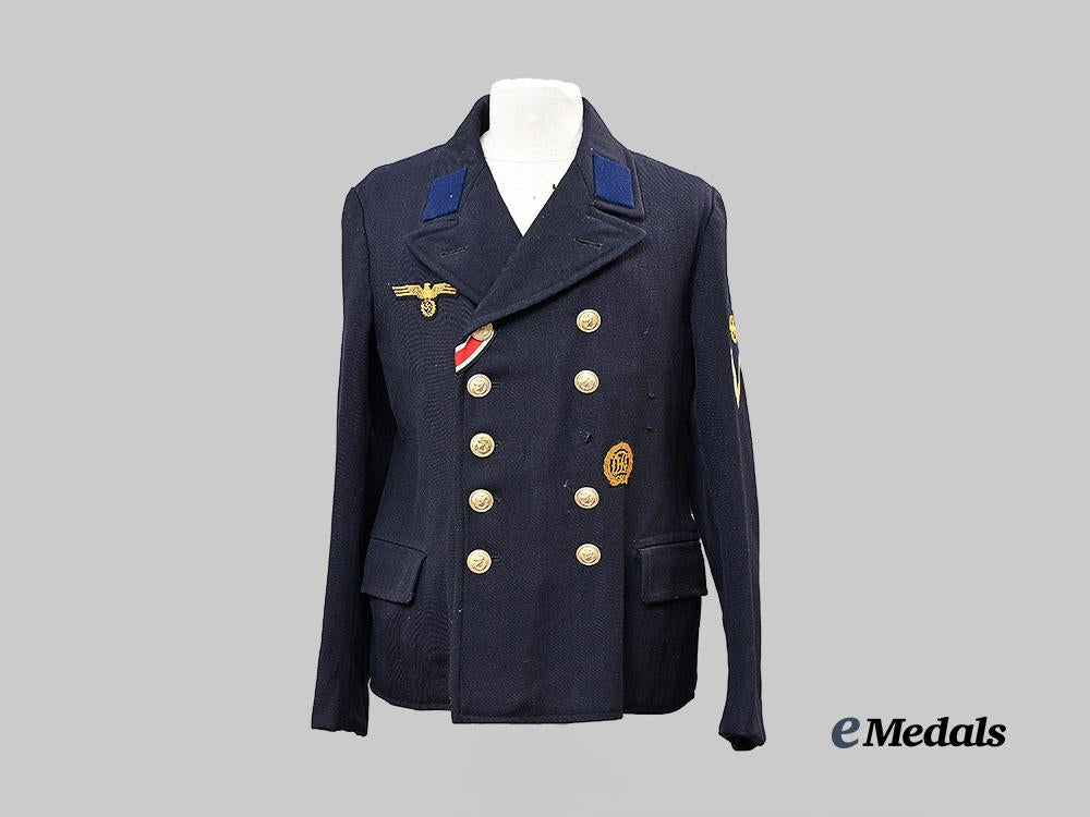 germany,_kriegsmarine._a_dark_blue_service_jacket_for_a_torpedo_mechanic_gefreiter_e_medals__g63219_2