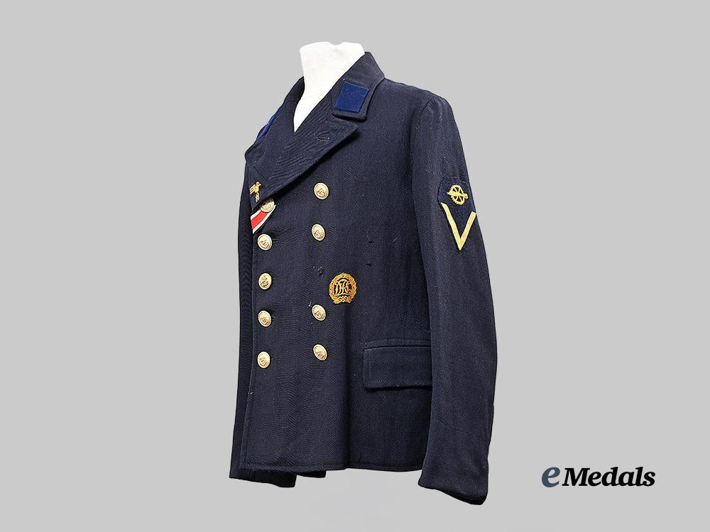 germany,_kriegsmarine._a_dark_blue_service_jacket_for_a_torpedo_mechanic_gefreiter_e_medals__g63219_3