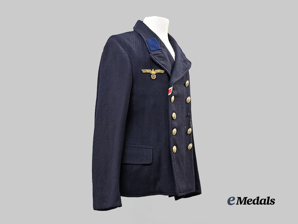 germany,_kriegsmarine._a_dark_blue_service_jacket_for_a_torpedo_mechanic_gefreiter_e_medals__g63219_4