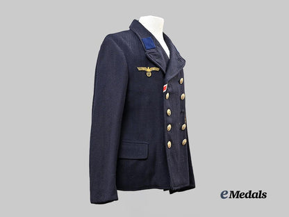 germany,_kriegsmarine._a_dark_blue_service_jacket_for_a_torpedo_mechanic_gefreiter_e_medals__g63219_4