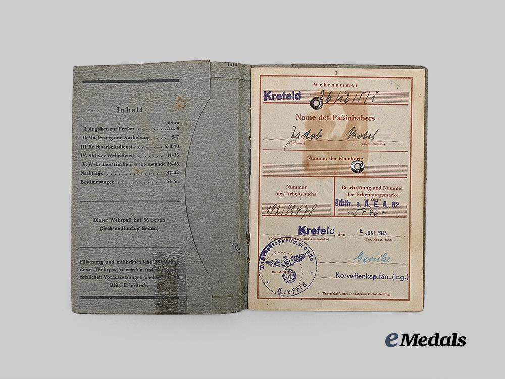 germany,_heer._a_wehrpaß_to_jacob_motes,_panzer_and_flak_troops_e_medals__g63239_9