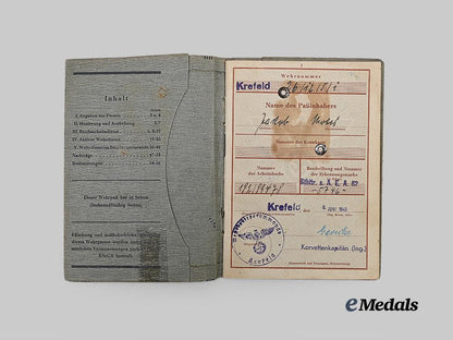 germany,_heer._a_wehrpaß_to_jacob_motes,_panzer_and_flak_troops_e_medals__g63239_9