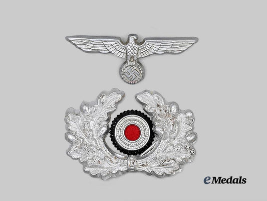 germany,_heer._a_set_of_visor_cap_insignia_for_enlisted_ranks,_by_f._w._assmann&_söhne_e_medals__g63260_2