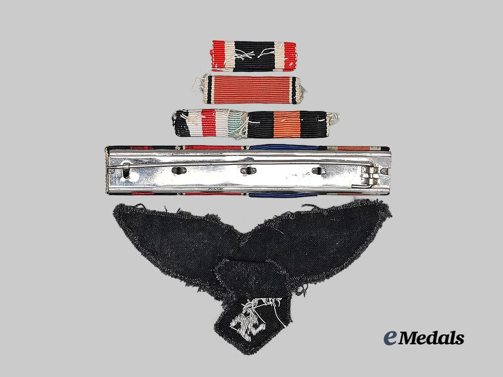 germany,_luftwaffe._an_officer's_breast_eagle,_with_ribbon_bars_e_medals__g63269_3