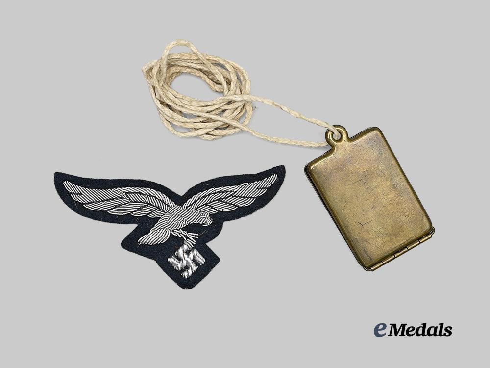 germany,_luftwaffe._an_officer’s_breast_eagle,_with_locket_e_medals__g63270_2