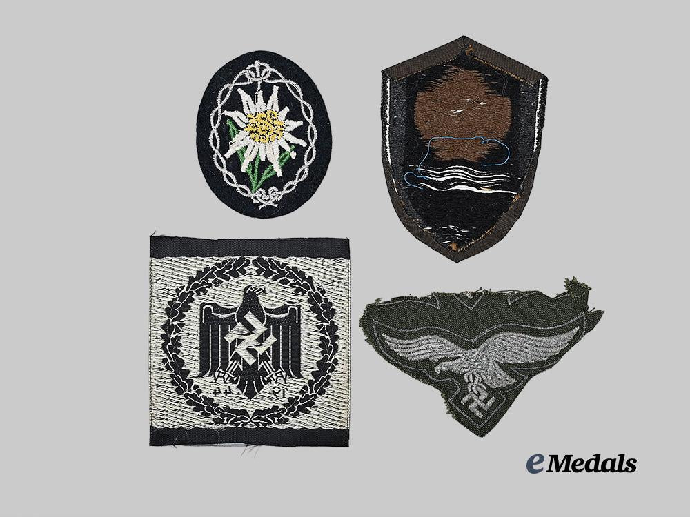 germany,_third_reich._a_mixed_lot_of_cloth_insignia_for_military,_labour,_and_sports_service_e_medals__g63298_3
