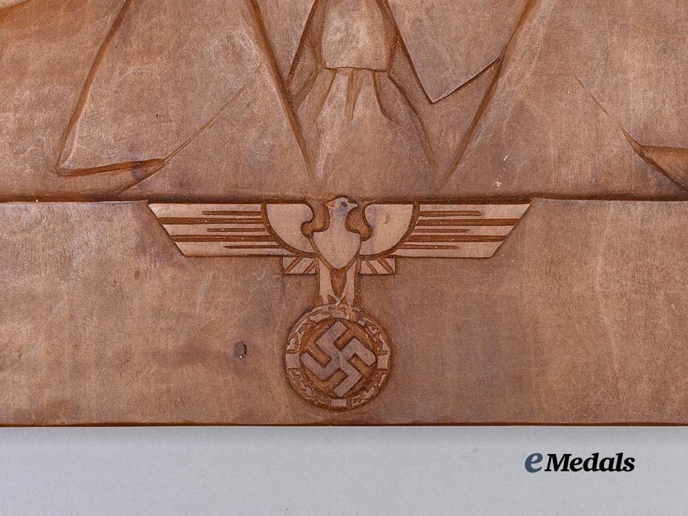 germany,_third_reich._a_fine_hand-_carved_wooden_relief_of_a_h_e_medals__g63311_3