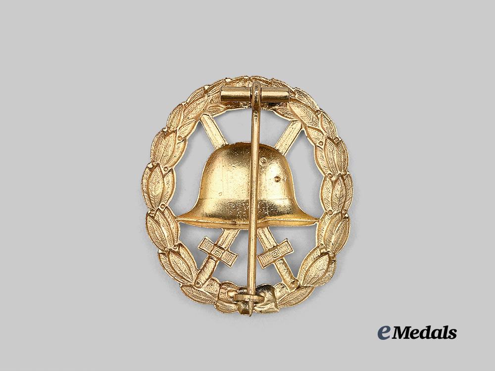 germany,_imperial._a_mint_gold_grade_wound_badge,_cut-_out_version_e_medals__g63485_3