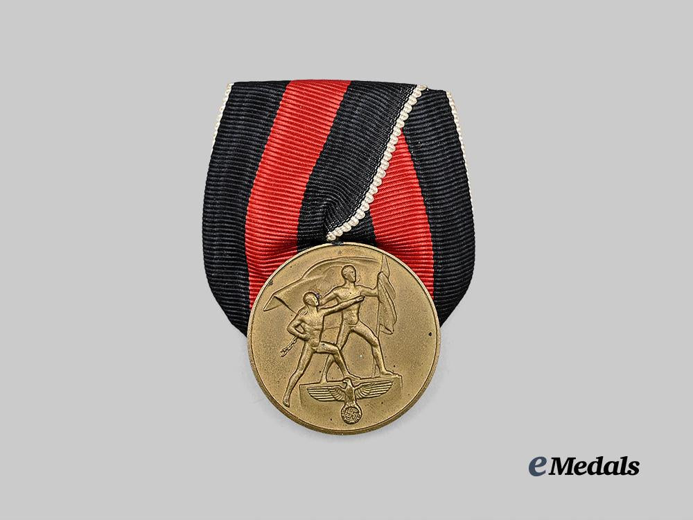 germany,_third_reich._a_sudetenland_medal,_on_parade_mount_with_package,_by_josef_bergs&_co._e_medals__g63516_4