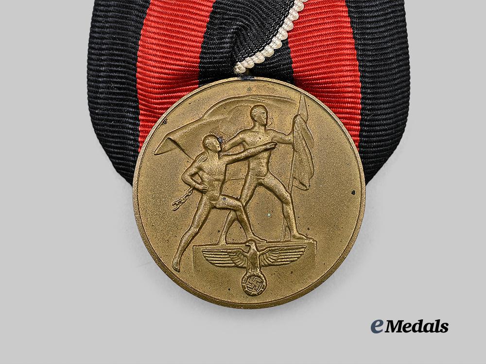 germany,_third_reich._a_sudetenland_medal,_on_parade_mount_with_package,_by_josef_bergs&_co._e_medals__g63516_5