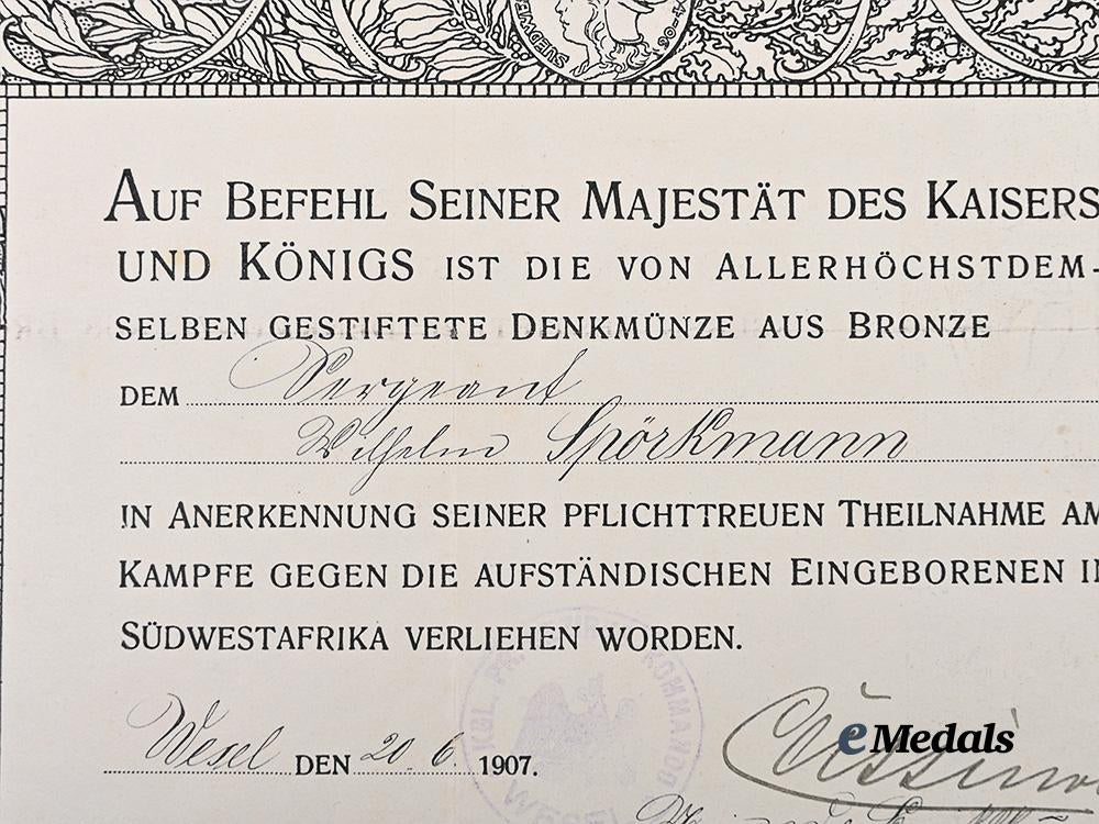 germany,_imperial._a_south_west_africa_medal_for_combatants,_with_award_document,_to_wilhelm_spörkmann_e_medals__g63519_5