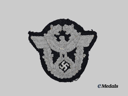 germany,_ordnungspolizei._a_feuerwehr_officer’s_sleeve_eagle_e_medals__g63551_2