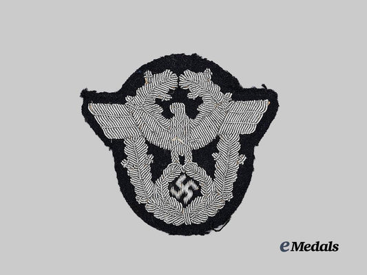 germany,_ordnungspolizei._a_feuerwehr_officer’s_sleeve_eagle_e_medals__g63551_2