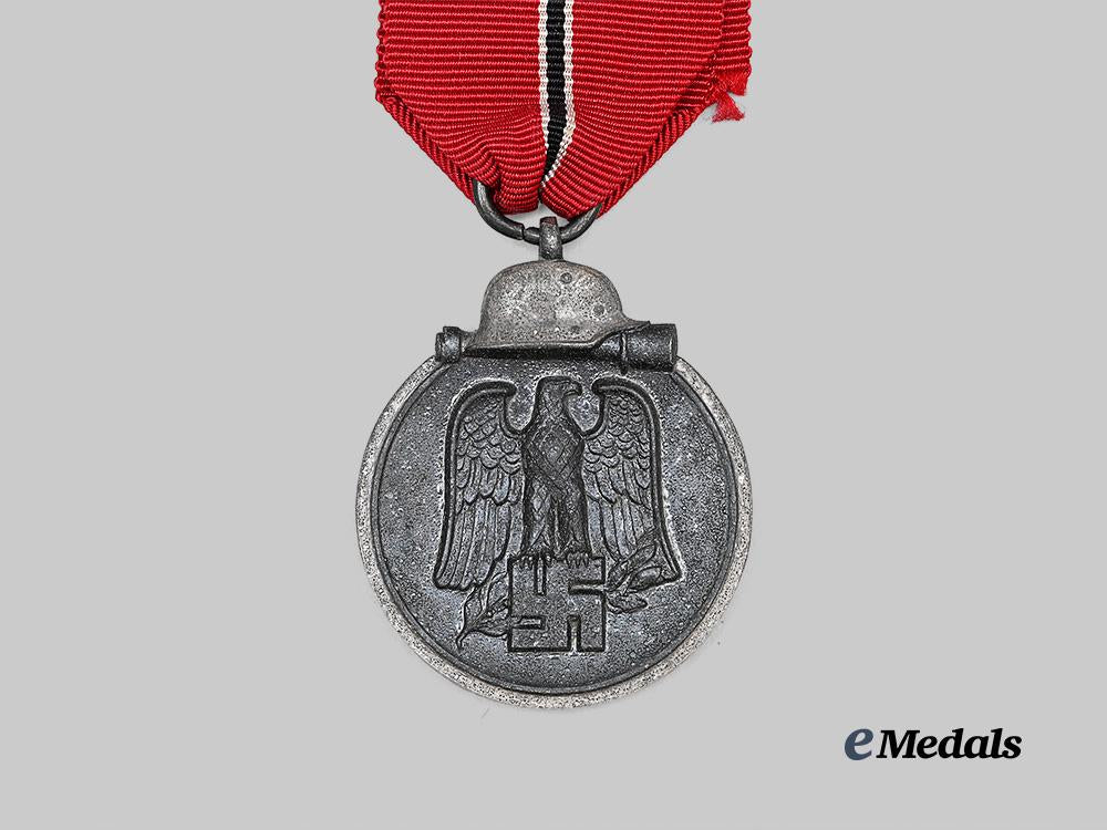 germany,_heer._a_blue_division_eastern_front_medal_and_award_document,_with_boutonniere_e_medals__g63579_9