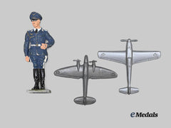 Germany, Luftwaffe. A Hand-Painted General Figurine, with Winterhilfswerk Donation Tokens