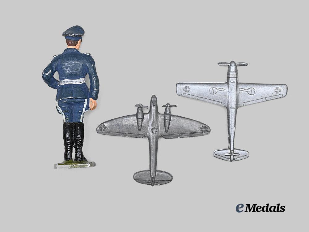 germany,_luftwaffe._a_hand-_painted_general_figurine,_with_winterhilfswerk_donation_tokens_e_medals__g63581_3