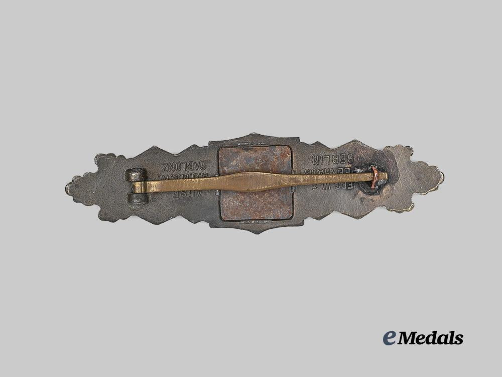 germany,_wehrmacht._a_close_combat_clasp,_bronze_grade,_large_font_variant_by_a._g._m.u._k._e_medals__g63582_3