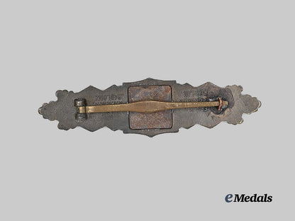 germany,_wehrmacht._a_close_combat_clasp,_bronze_grade,_large_font_variant_by_a._g._m.u._k._e_medals__g63582_3
