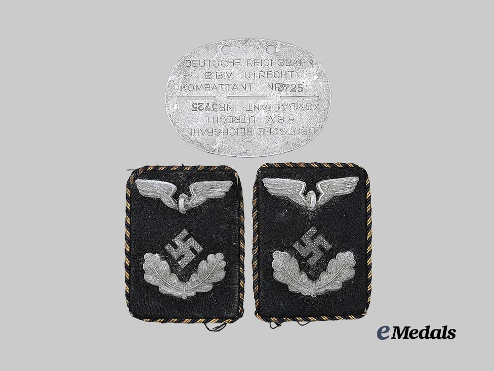 germany,_third_reich._a_reichsbahn_occupied_netherlands_representative_i_d_tag,_with_collar_tabs_e_medals__g63589_2