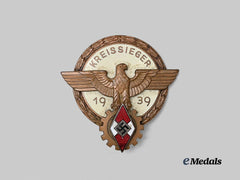 Germany, HJ. A 1939 National Trade Competition Victor’s Badge, Bronze Grade, by Ferdinand Wagner