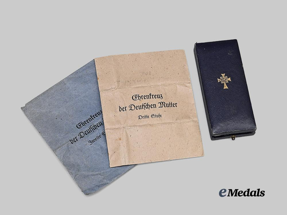 germany,_third_reich._a_lot_of_honour_cross_of_the_german_mother,_all_grades,_with_cases_and_packages_e_medals__g63598_2