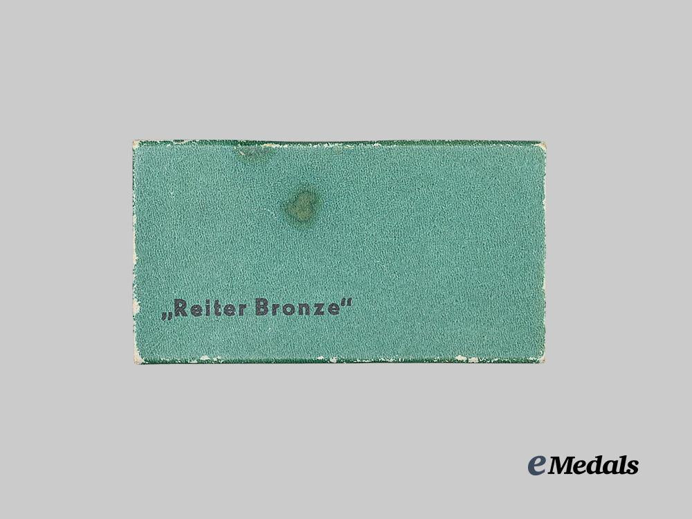 germany,_third_reich._a_german_equestrian_badge,_bronze_grade_with_case,_by_steinhauer&_lück_e_medals__g63611_2