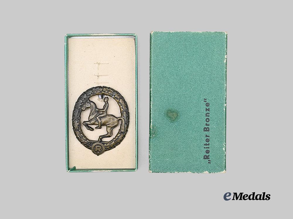 germany,_third_reich._a_german_equestrian_badge,_bronze_grade_with_case,_by_steinhauer&_lück_e_medals__g63611_3