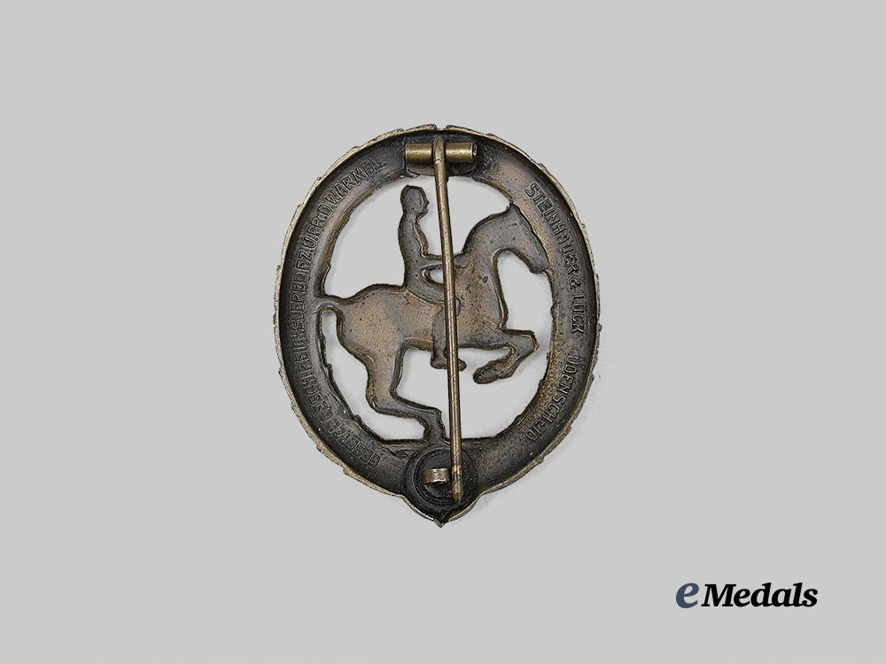 germany,_third_reich._a_german_equestrian_badge,_bronze_grade_with_case,_by_steinhauer&_lück_e_medals__g63611_6