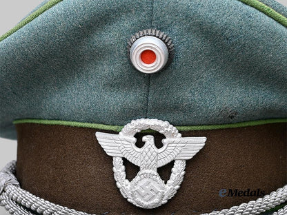 germany,_ordnungspolizei._a_schutzpolizei_visor_cap_for_officer_ranks_e_medals__g63653_10
