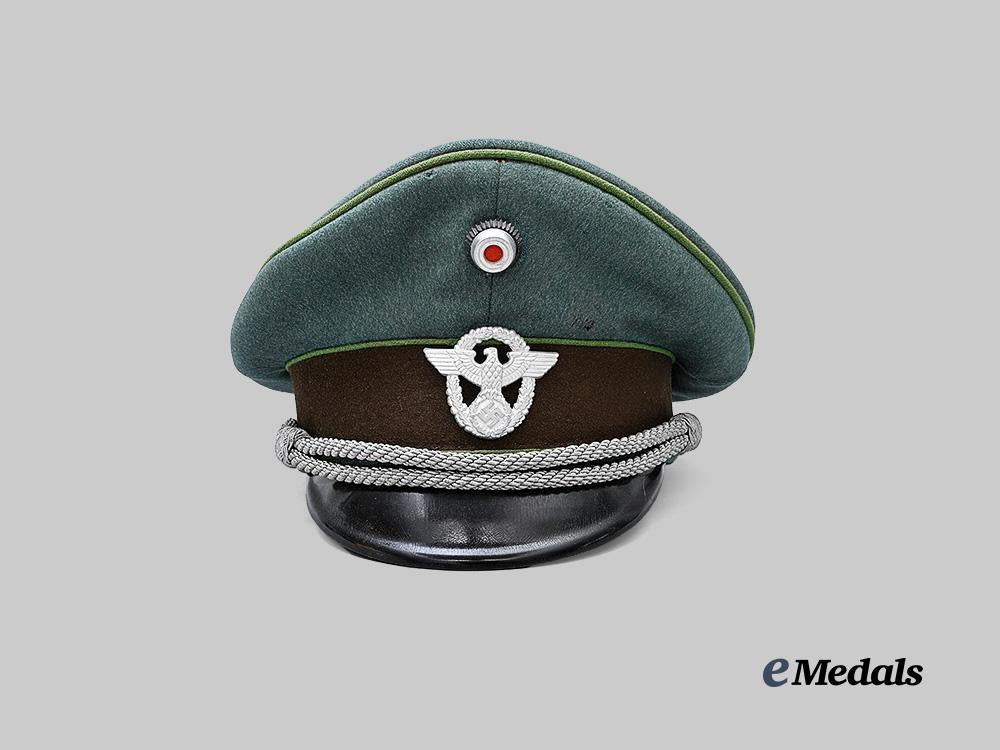 germany,_ordnungspolizei._a_schutzpolizei_visor_cap_for_officer_ranks_e_medals__g63653_2