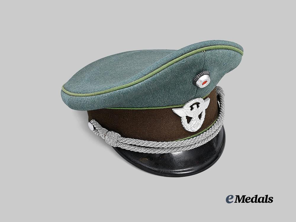 germany,_ordnungspolizei._a_schutzpolizei_visor_cap_for_officer_ranks_e_medals__g63653_3