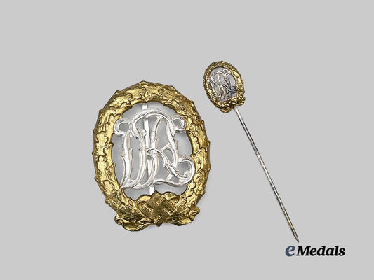 germany,_third_reich._a_mint_d_r_l_sports_badge_for_war_wounded,_with_stick_pin_miniature,_by_hermann_wernstein_e_medals__g63813_2