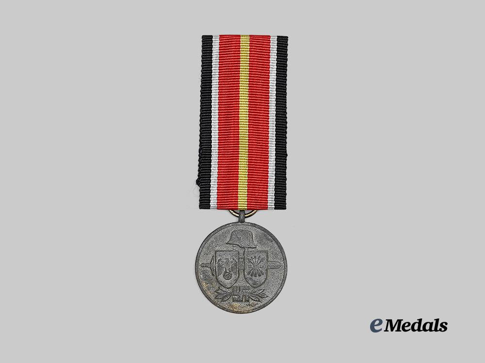 germany,_wehrmacht._a_spanish_volunteer_medal,_with_issue_package,_by_deschler&_sohn_e_medals__g63816_4