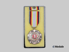 Germany, DDR. A Rare Military Merit Order, II Class in Silver, with Ribbon Bar and Case