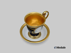 Germany, Imperial. A 1915 Kaiser Wilhelm II Patriotic Cameo Cup and Saucer, by Lorenz Hutschenreuther