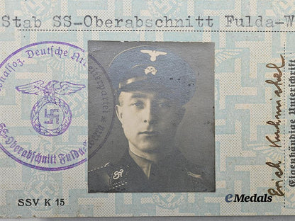 germany,_s_s._a_rare_identity_card_to_s_s-_unterscharführer_erich_kuhmichel,_with_royal_s_s-_obergruppenführer_signature_e_medals__g63949_3