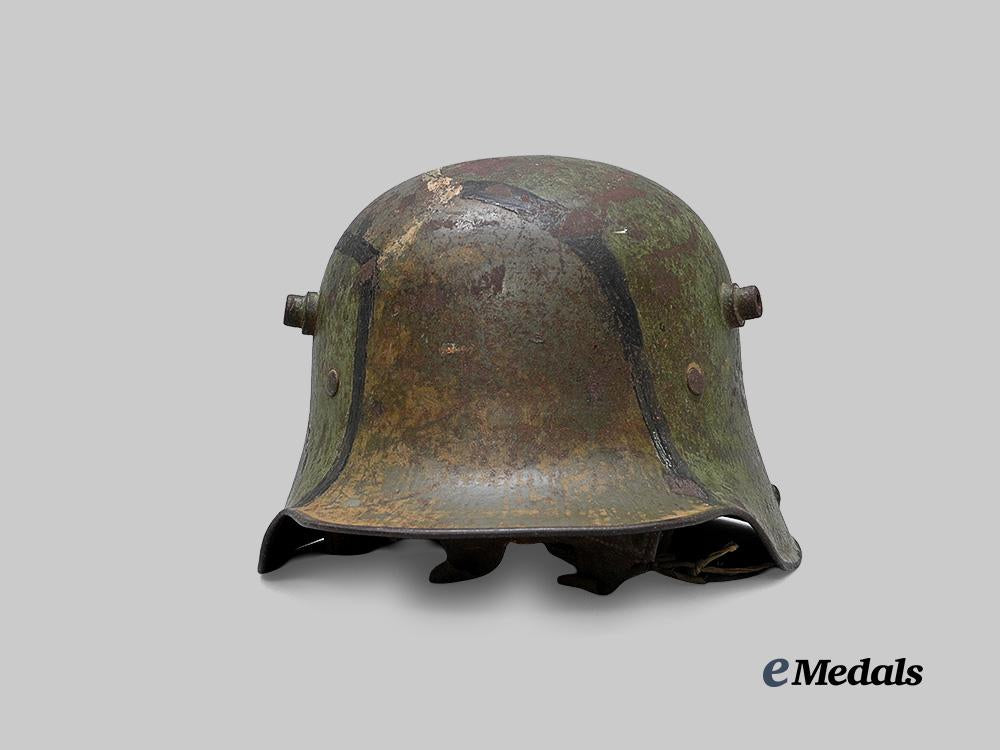 germany,_imperial._an_m16_camouflage_stahlhelm,_owner-_attributed_example,_by_gebrüder_gnüchtel_a._g._e_medals__g64048_2