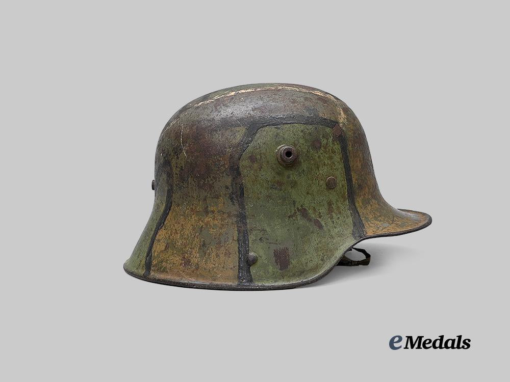 germany,_imperial._an_m16_camouflage_stahlhelm,_owner-_attributed_example,_by_gebrüder_gnüchtel_a._g._e_medals__g64048_4