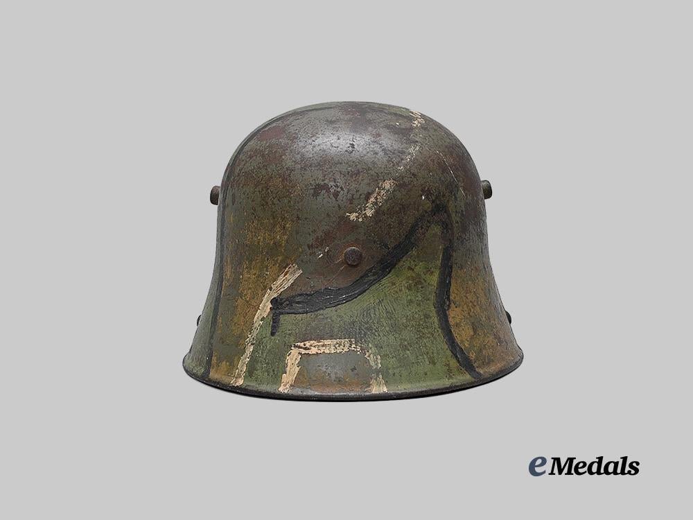 germany,_imperial._an_m16_camouflage_stahlhelm,_owner-_attributed_example,_by_gebrüder_gnüchtel_a._g._e_medals__g64048_5