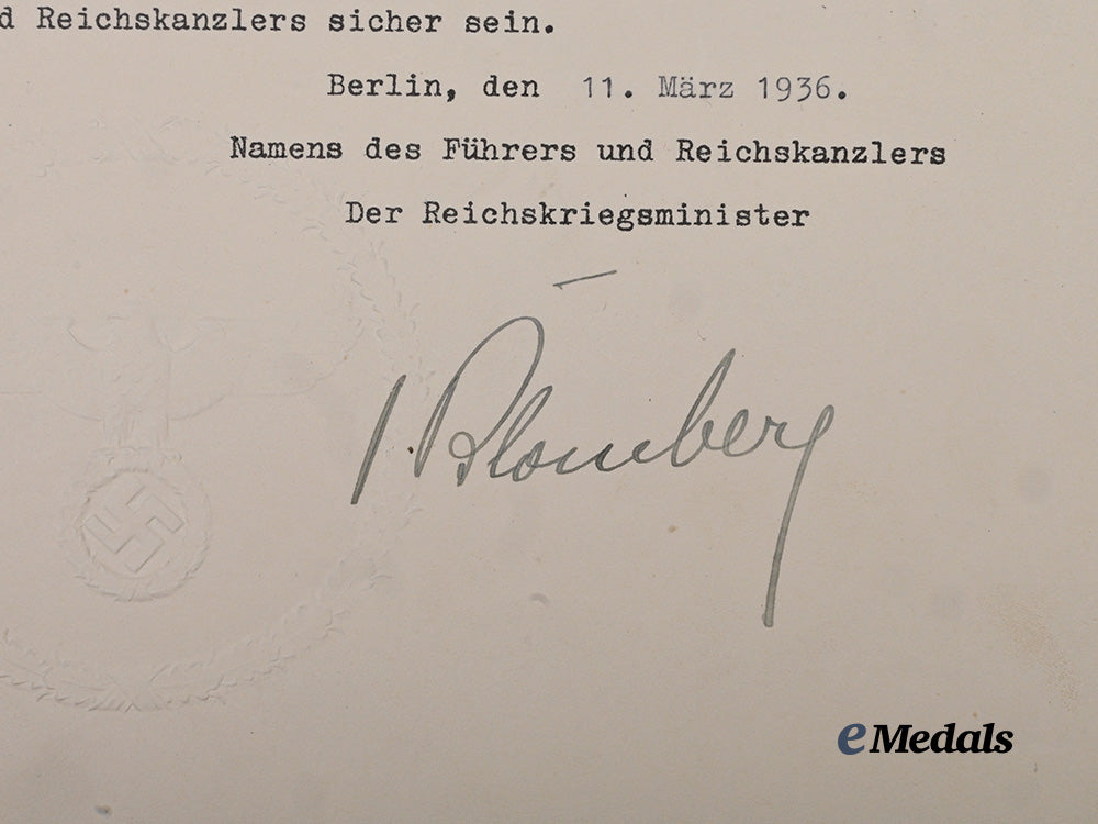germany,_wehrmacht._a_promotion_document_to_hauptmann_hans_messinger,_with_werner_von_blomberg_signature_e_medals__g64265_3